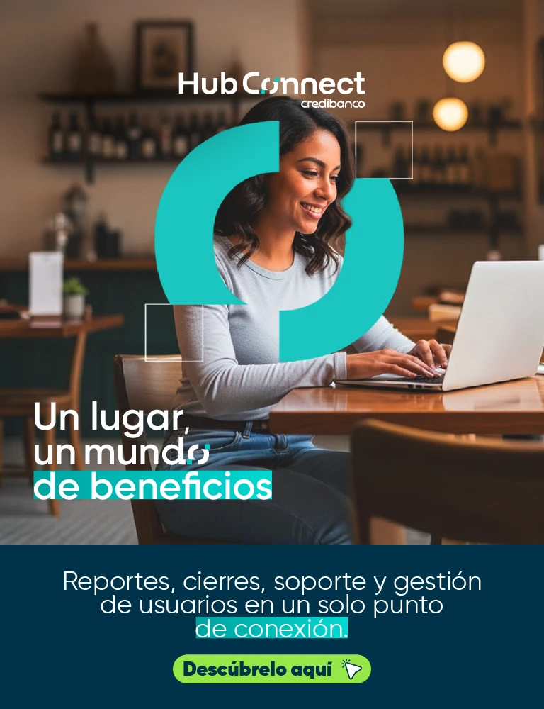 Banner promocional de HubConnect Credibanco con mujer usando un portátil en una cafetería, acompañado del mensaje “Un lugar, un mundo de beneficios” y texto sobre reportes, cierres, soporte y gestión de usuarios en un solo punto de conexión.